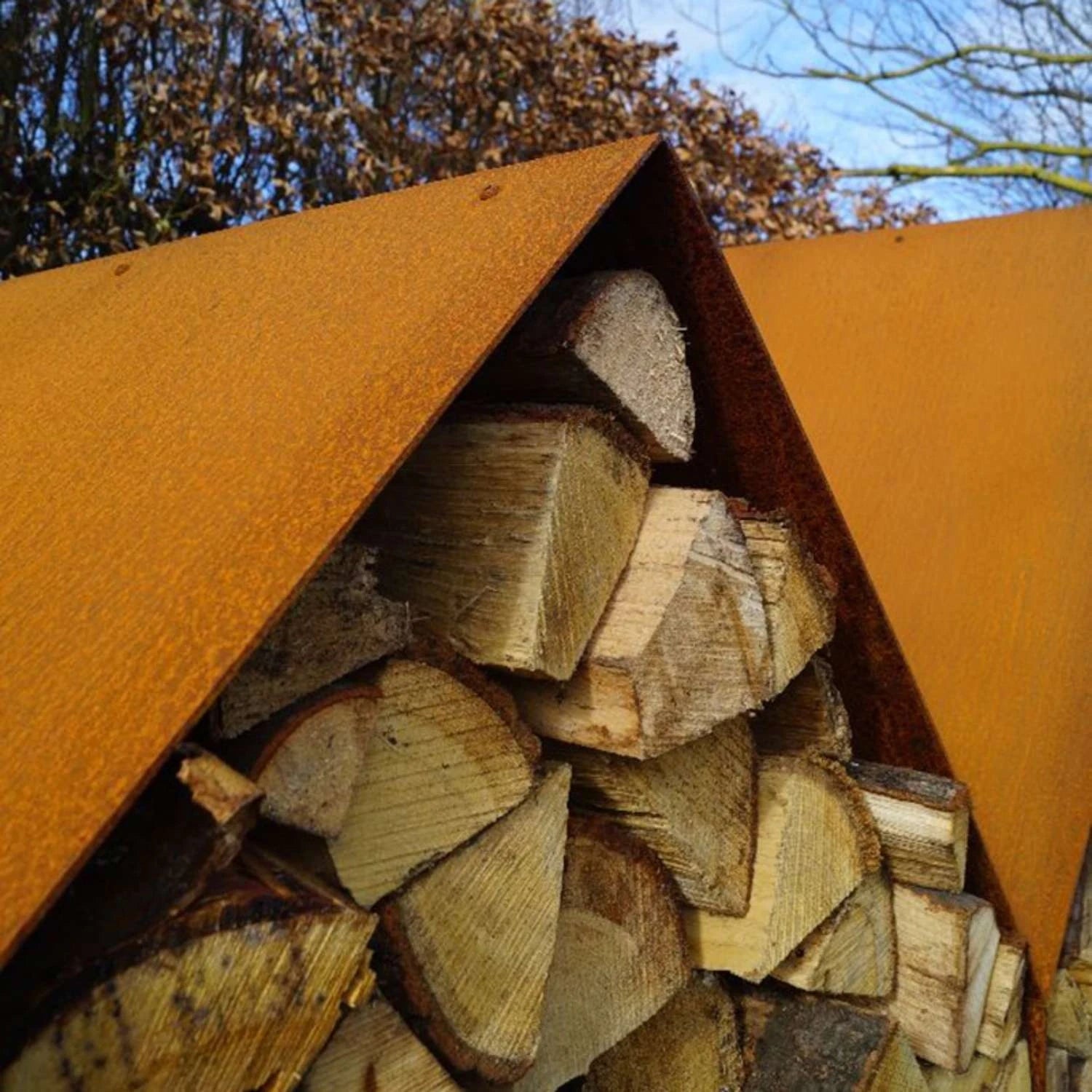 Bruges 2 Houses Log Storage, a practical and stylish way to store firewood in outdoor spaces like gardens and patios