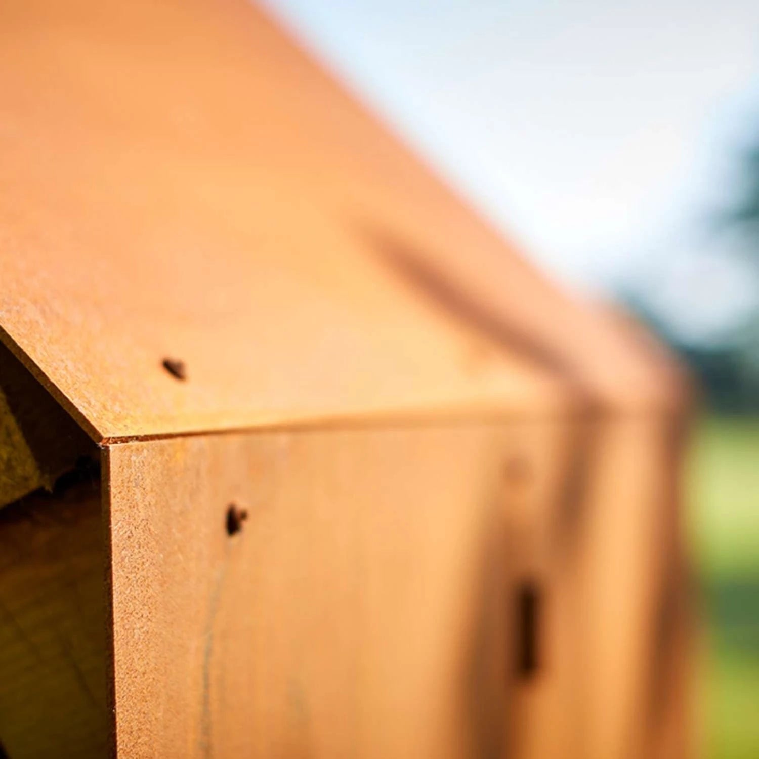 Bruges 3 Houses Log Storage, a spacious and durable solution for storing firewood in outdoor spaces like gardens and patios.