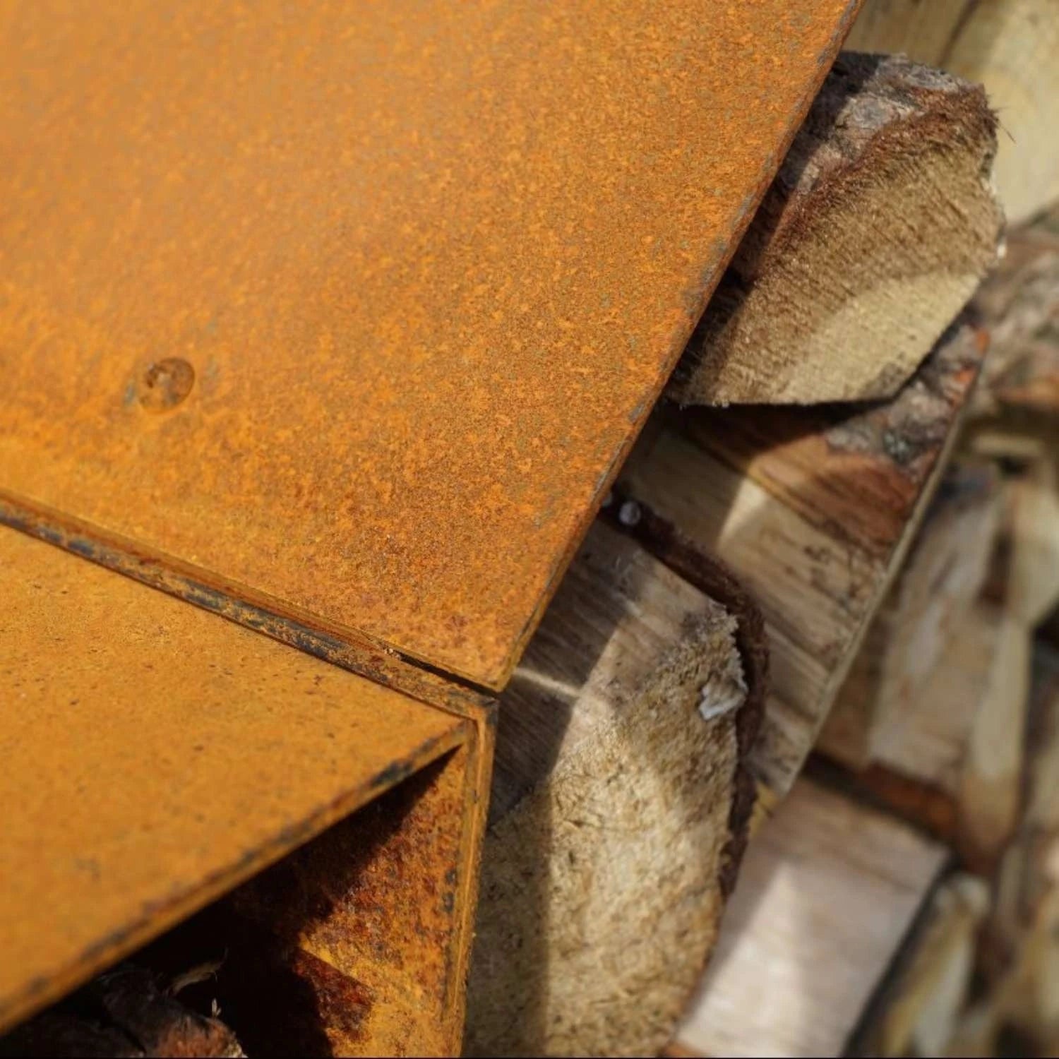 Bruges 2 Houses Log Storage, a practical and stylish way to store firewood in outdoor spaces like gardens and patios