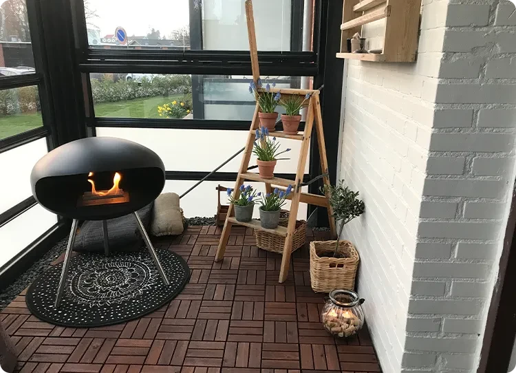Cocoon terra freestanding bioethanol fireplace in balcony
