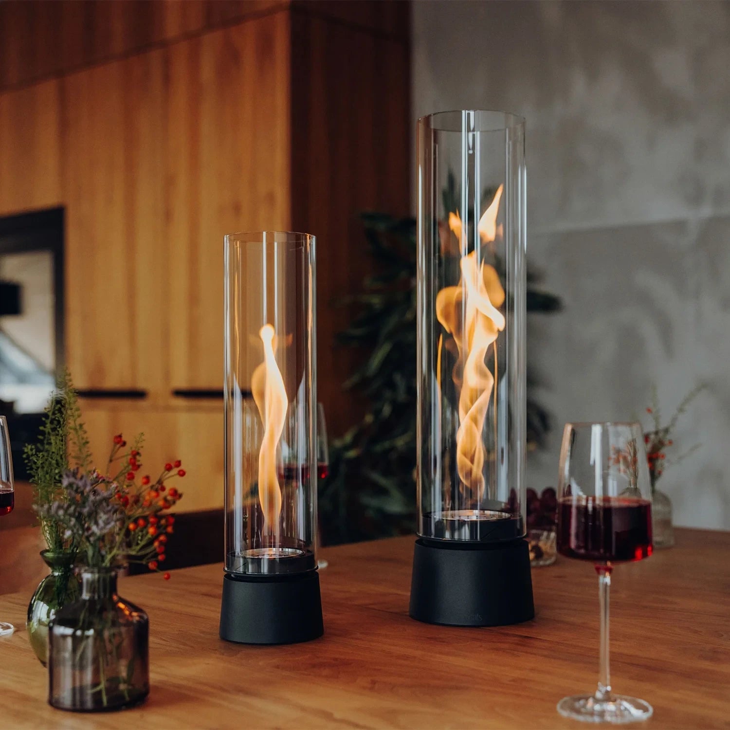 Höfats SPIN Air 1200 - Matt black table bioethanol fireplace with tall cylindrical glass.