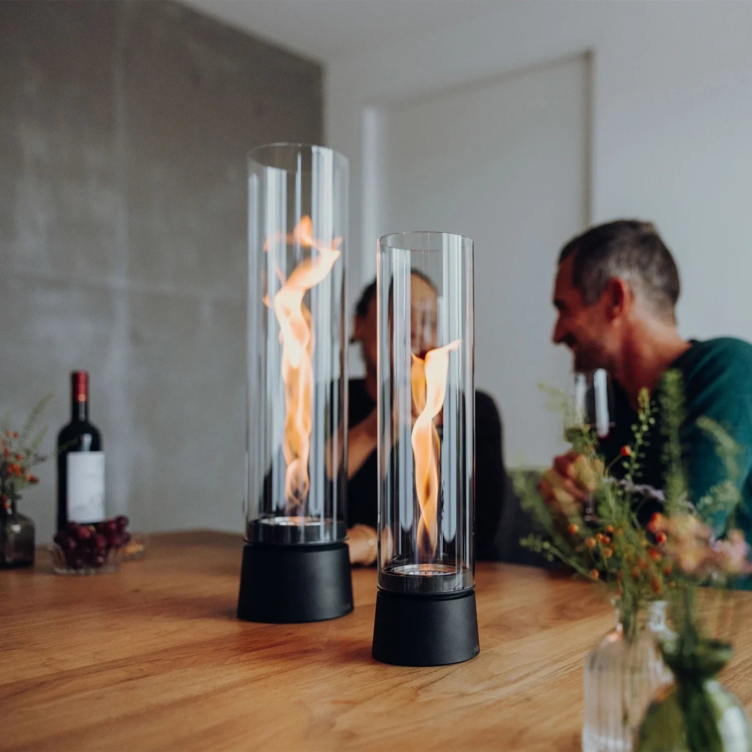 Höfats SPIN Air 900 matte black tabletop fireplace with high cylindrical glass and rotating flame