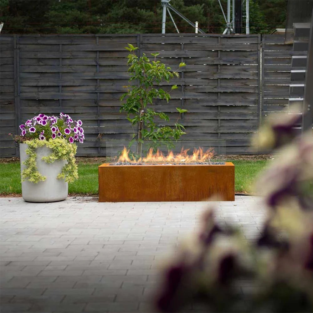 Planika Galio Outdoor gas fireplace in corten steel finish and with manual control system