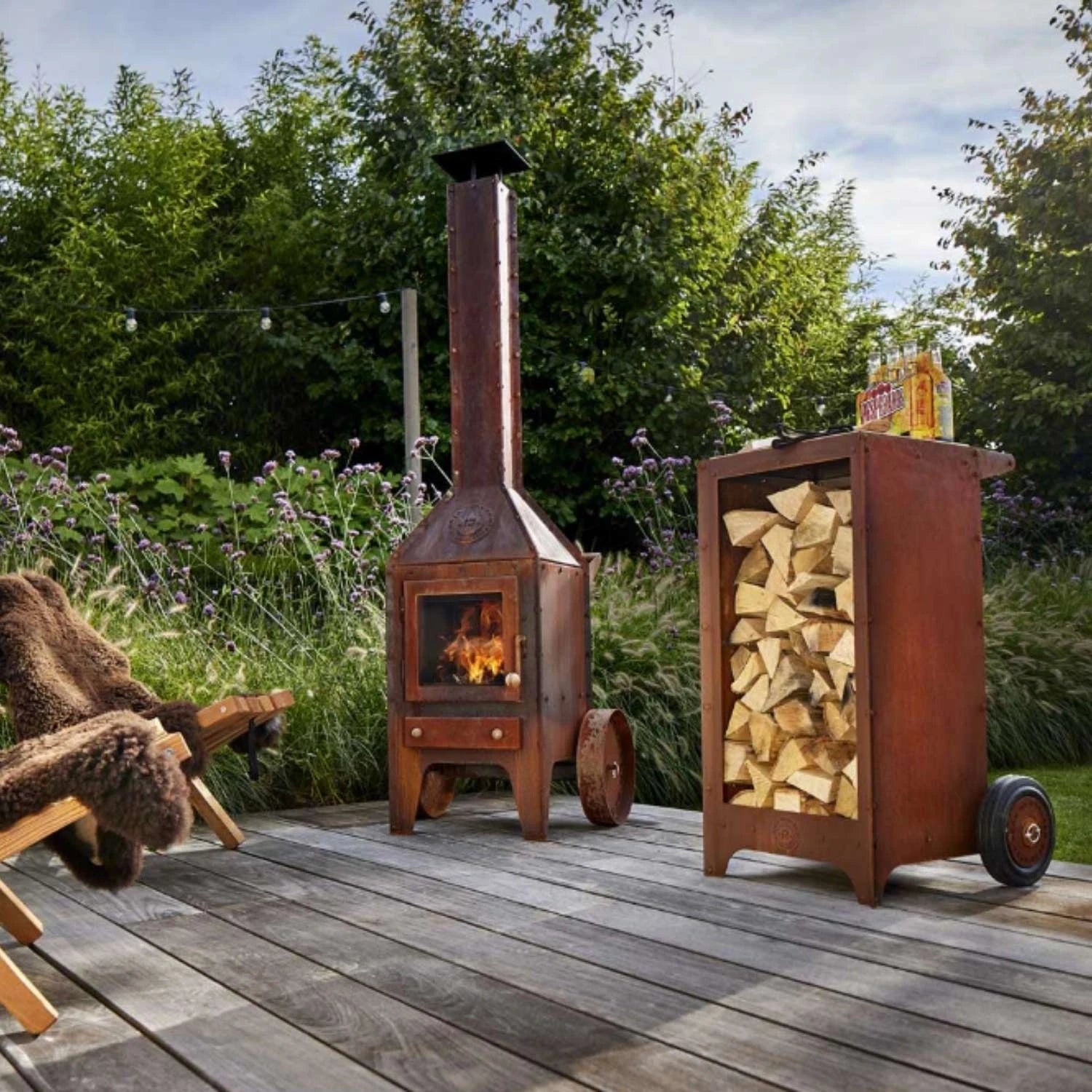 Ker Log Storage, a compact and durable solution for storing firewood in outdoor spaces like gardens and patios.