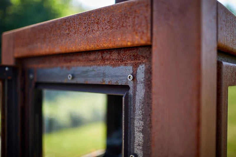 Quaruba L mobile rusted steel fireplace for the garden
