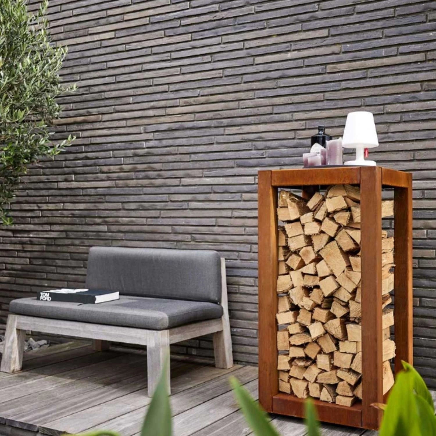 Quarubox Log Storage, a sleek and durable solution for storing firewood in outdoor spaces like gardens and patios.