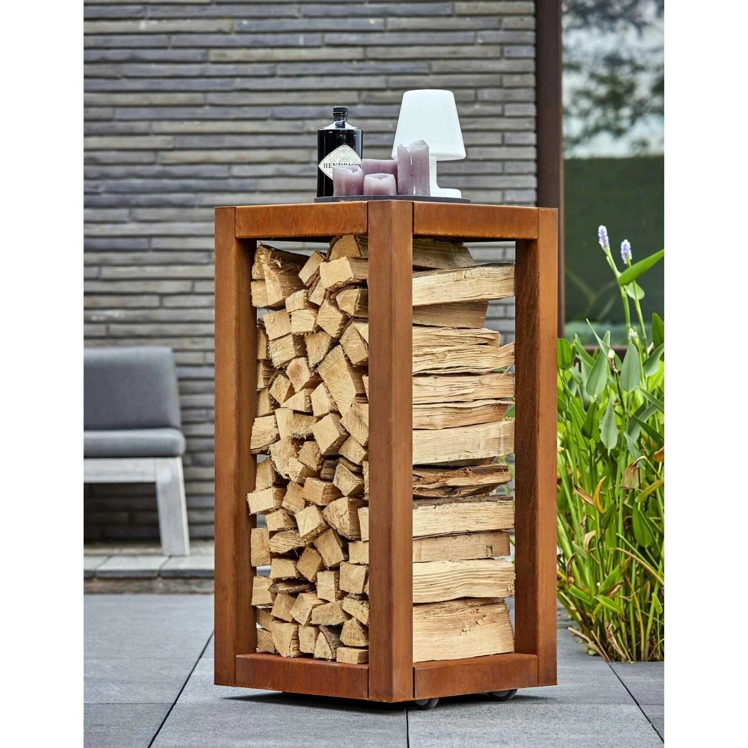 Quarubox Log Storage, a sleek and durable solution for storing firewood in outdoor spaces like gardens and patios.