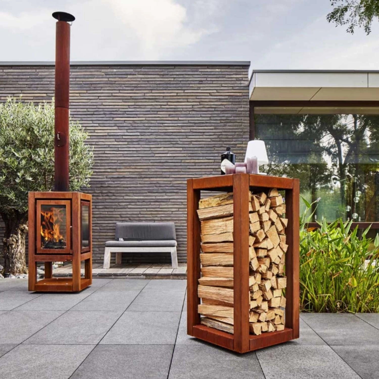 Quarubox Log Storage, a sleek and durable solution for storing firewood in outdoor spaces like gardens and patios.